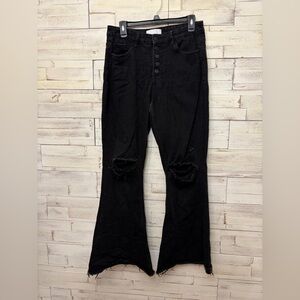 Vervet size 30 black flare jeans (see flaw stretched out on thigh)‎